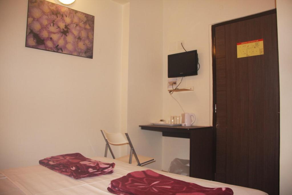 Down Town Guest House Kalkutta Zimmer foto